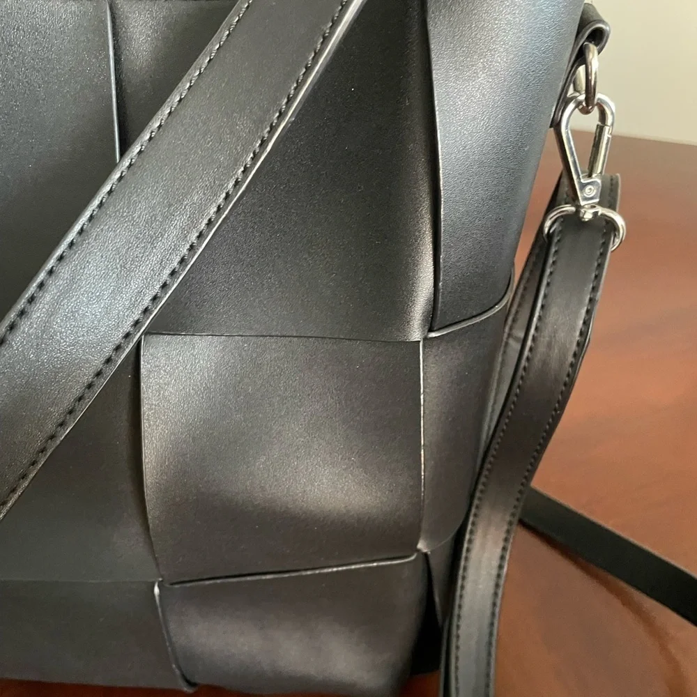 Expression NYC women’s black large wowen pattern Foux leather shoulder bag.
